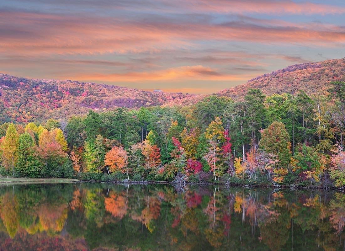 About Our Agency - Fall Foliage Reflected in the Lake at Cheaha State Park, Alabama
